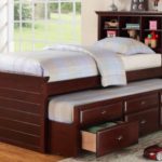 Cherry finish wood panel design twin trundle bed with bookcase headboard and drawers